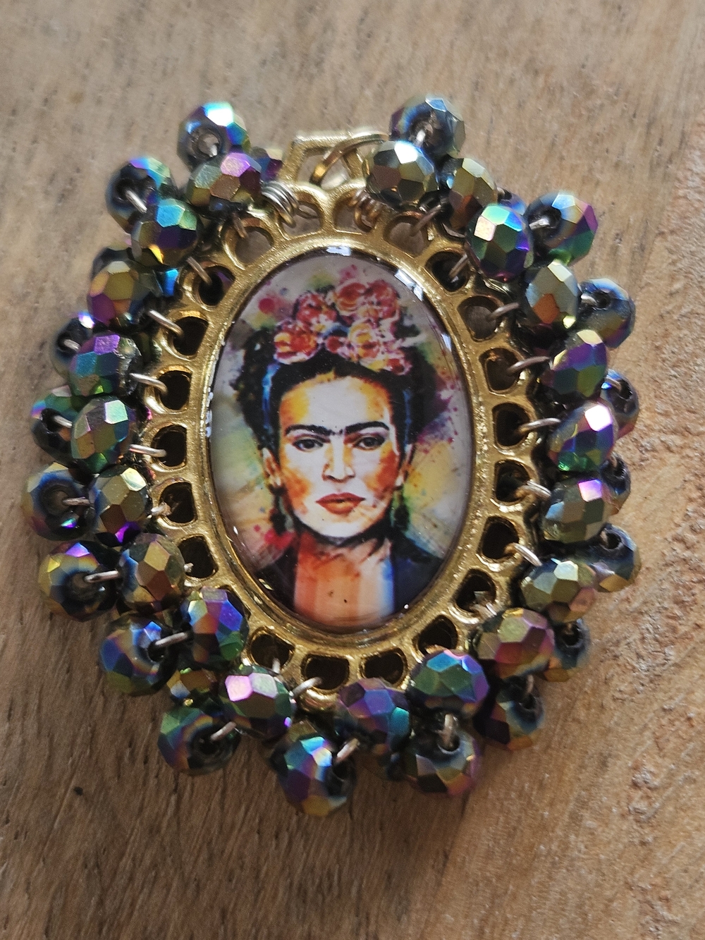 Gold-Tone Frida Kahlo Portrait Brooch with Multicolor Beads